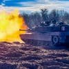 A tank crew with 1st Battalion, 64th Armor Regiment, 1st Armored Brigade Combat Team, 3rd Infantry Division, fires the main cannon of an M1A2 SEPv3 Main Battle Tank for the Live-fire Accuracy Screening Test (LFAST) of a tank gunnery training event at Fort Stewart, Georgia, Jan. 18, 2024. During LFAST crews ensure that their weapons are sighted and are accurate before continuing with the rest of the gunnery. (U.S. Army photo by Pfc. Luciano Alcala)