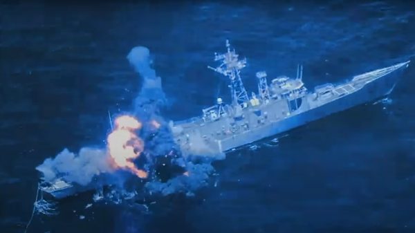 The USS Rodney M. Davis (FFG-60), an Oliver Hazard Perry-class guided missile frigate, was hit and sunk by anti-ship missiles.