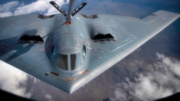 A U.S. Air Force B-2 Spirit assigned to the 509th Bomb Wing, Whiteman Air Force Base, Missouri, is refueled by a KC-135 Stratotanker assigned to the 351st Aerial Refueling Squadron, RAF Mildenhall, during the Bomber Task Force training exercise over England, Aug. 29, 2019. Training with partners, allied nations and other U.S. Air Force units contributes to global readiness and enables the strengthening of enduring and strategic relationships throughout the theater. (U.S. Air Force photo by Tech. Sgt. Emerson Nuñez)