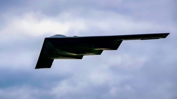 A B-2 Spirit assigned to the 509th Bomb Wing flies overhead at RAF Fairford, England, Aug. 25, 2021. The B-2 flyover was part of a Bomber Task Force mission in which aircraft conduct theater and flight training across Europe and Africa. The BTF missions, which have been occurring since 2018, provide theater familiarization for aircrew members and opportunities for U.S. integration with NATO allies and regional partners. The bomber missions enhance readiness and provide the training necessary to respond to any potential crisis or challenge across the globe. (U.S. Air Force photo by Senior Airman Eugene Oliver)