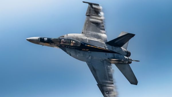 Members of the US Navy F/A-18F Super Hornet Demo Team performs a maneuver at the Wings Over South Texas Air Show. This year's air show marks the first return of Wings Over South Texas to Naval Air Station Corpus Christi since 2019.