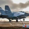 A U.S. Navy F/A-18F Super Hornet, assigned to the “Black Knights” of Strike Fighter Squadron (VFA) 154, lands on the flight deck of Nimitz-class aircraft carrier USS Theodore Roosevelt (CVN 71), July 24, 2025. Theodore Roosevelt, flagship of Carrier Strike Group (CSG) 9, is underway conducting exercises to bolster strike group readiness and capability in the U.S. 3rd Fleet area of operations. (U.S. Navy photo by Mass Communication Specialist 3rd Class Aaron Haro Gonzalez)