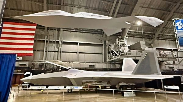 YF-118G Bird of Prey and F-22 Raptor