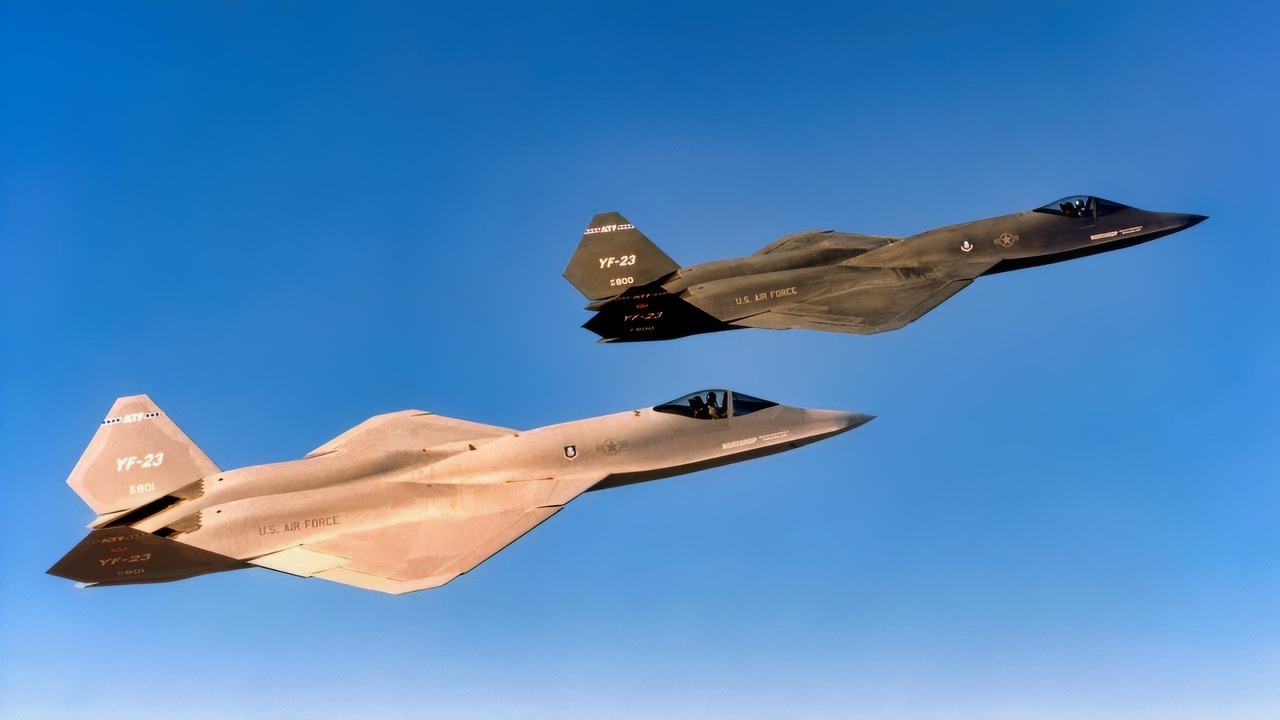 The two Northrop-McDonnell Douglas YF-23 prototypes in flight. The aircraft on display at the National Museum of the United States Air Force is the darker one on the right. (U.S. Air Force photo)