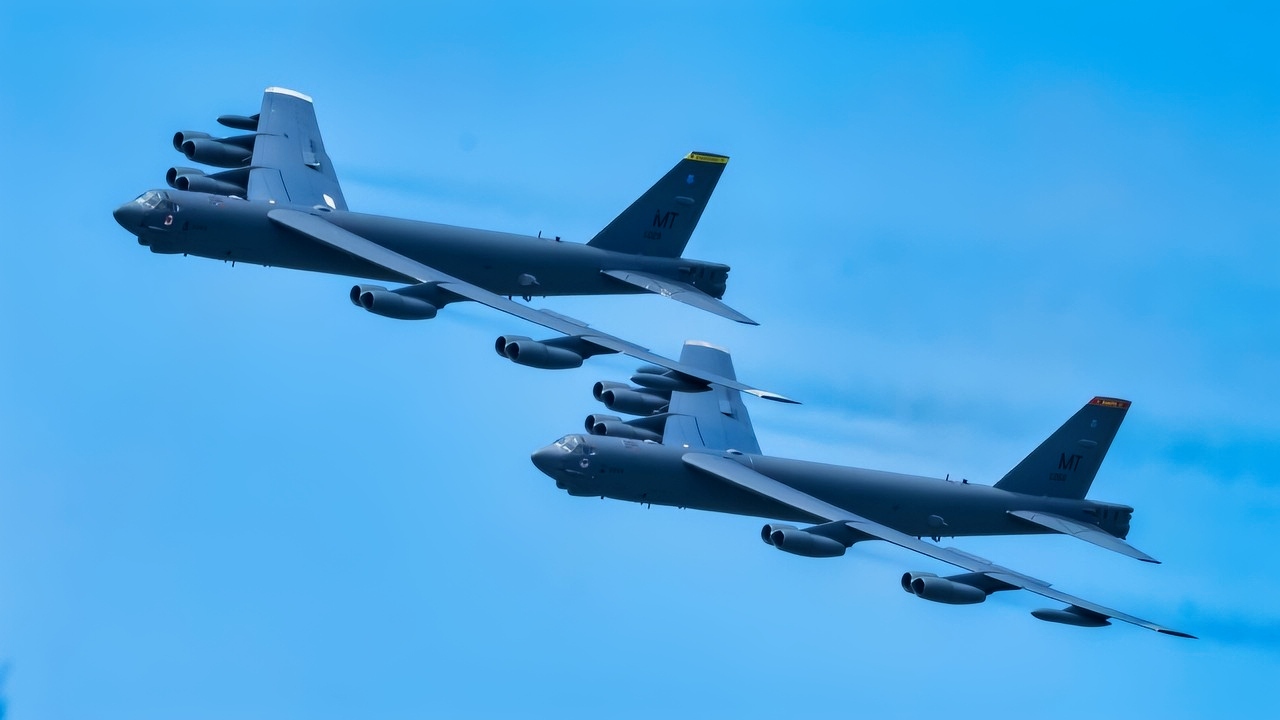 U.S. Air Force B-52H Stratofortress aircraft fly by the 81st Liberation Day Parade, leveraging a training sortie during the U.S. Air Force's 2025 Department-Level Exercise series in Guam, July 21, 2025. The flights consisted of 13 waves of aircraft from the U.S. Air Force, Royal New Zealand Air Force, Japan Air Self-Defense Force and Republic of Korea Air Force, showcasing the U.S. and its allies’ commitment to a free and open Indo-Pacific region. The DLE encompasses all branches of the Department of Defense, Allies, and partners, employing over 400 joint and coalition aircraft and more than 12,000 personnel across more than 50 locations spanning 3,000 miles. (U.S. Air Force photo by Senior Airman Jade M. Caldwell)