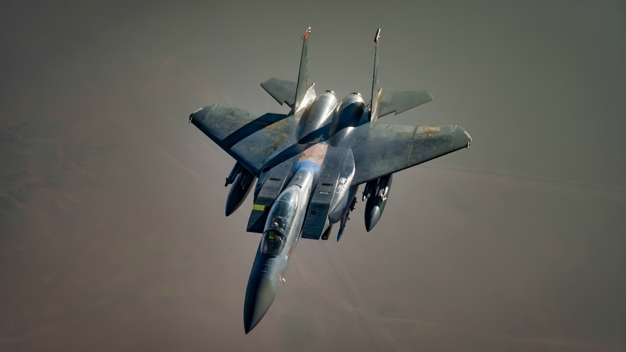 A U.S. Air Force F-15E Strike Eagle conducts a combat air patrol in the Air Force Central Command area of responsibility, June 10, 2025. These patrols are conducted in order to deter aggression and aid stability within the region. (U.S. Air Force Photo by Staff Sgt. John C.B. Ennis)