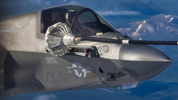 A U.S. Marine Corps KC-130J Super Hercules aircraft with Marine Aerial Refueler Transport Squadron (VMGR) 152 refuels an F-35B Lightning II aircraft with Marine Fighter Attack Squadron (VMFA) 121, both assigned to Marine Aircraft Group 12, 1st Marine Aircraft Wing, during exercise Red-Flag Alaska 25, at Joint Base Elmendorf-Richardson, Alaska, July 21, 2025. VMGR-152 partnered with the U.S. Air Force during Red Flag Alaska to enhance aerial refueling and assault support capabilities. Training in Alaska’s harsh environment sharpened the squadron’s combat readiness and lethality. (U.S. Marine Corps photo Lance Cpl. Cecilia Campbell)