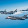 A formation of U.S. Air Force F-35 Lighting IIs and F-16 Fighting Falcons assigned to the 48th and 31st Fighter Wings respectively fly in formation as a part of Exercise Combined Strike along the coast of Italy, August 18, 2025. Exercises like Combined Strike ensure USAFE remains ready and postured to rely on one another to defend the area of responsibility. (U.S. Air Force photo by Senior Airman Zachary Jakel)