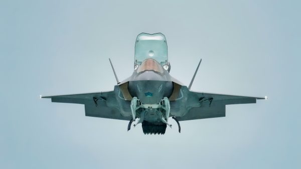A U.S. Marine Corps F-35B Lightning II assigned to the Marine Fighter Attack Squadron 242, Marine Aircraft Group (MAG) 12, Marine Corps Air Station, Iwakuni, conducts an aerial demonstration during the Singapore Airshow 2022 at Changi Exhibition Center, Republic of Singapore, Feb. 16, 2021. Through participation in regional events like the Singapore Airshow, the U.S. demonstrates its commitment to the security of the Indo-Pacific, promotes interoperability, displays the flexible combat capabilities of the U.S. Military, creates lasting relationships with international audiences, and strengthens partnerships throughout the Indo-Pacific region. (U.S. Air Force photo by Master Sgt. Richard P. Ebensberger).