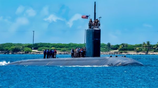 (June 11, 2025) – The Los Angeles-class fast-attack submarine USS Annapolis (SSN 760) transits Apra Harbor, Naval Base Guam, June 11, 2025. Assigned to Commander, Submarine Squadron 15, based at Polaris Point, Naval Base Guam, Annapolis is one of five forward-deployed fast-attack submarines. Renowned for their unparalleled speed, endurance, stealth, and mobility, fast-attack submarines are the backbone of the Navy’s submarine force. Regarded as apex predators of the sea, fast-attack submarines serve at the tip of the spear, helping to reaffirm the submarine force's forward-deployed presence in support of a free and open Indo-Pacific. (U.S. Navy photo by Lt. James Caliva)