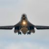 A U.S. Air Force B-1B Lancer assigned to the 345th Expeditionary Bomb Squadron, decends for landing at Ørland Air Base, Norway, during a Bomber Task Force Europe deployment, Aug. 9, 2025. The BTF mission highlights how we deliver effects rapidly across dynamic and contested environments through integrated training. (U.S. Air Force photo by Staff Sgt. Tambri Cason)