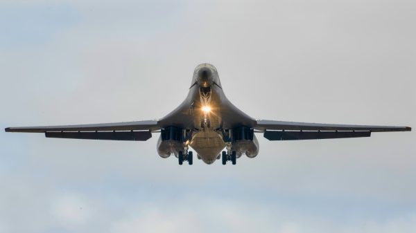A U.S. Air Force B-1B Lancer assigned to the 345th Expeditionary Bomb Squadron, decends for landing at Ørland Air Base, Norway, during a Bomber Task Force Europe deployment, Aug. 9, 2025. The BTF mission highlights how we deliver effects rapidly across dynamic and contested environments through integrated training. (U.S. Air Force photo by Staff Sgt. Tambri Cason)