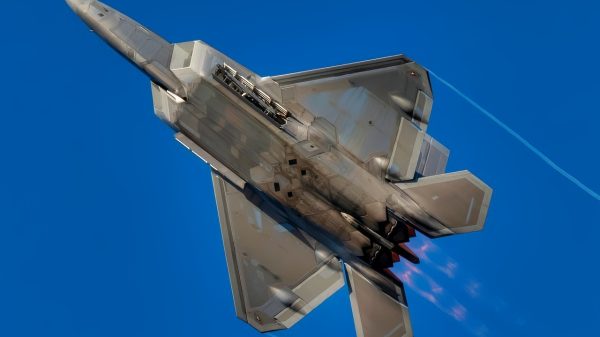 A U.S. Air Force F-22 Raptor assigned to Joint Base Langley-Eustis, Virginia, takes off during Checkered Flag 23-1 at Tyndall Air Force Base, Florida, Nov. 4, 2022. Checkered Flag is a large-force aerial exercise which fosters readiness and interoperability through the incorporation of 4th and 5th-generation aircraft during air-to-air combat training. The 23-1 iteration of the exercise was held Oct. 31 - Nov. 10, 2022. (U.S. Air Force photo by Tech. Sgt. Betty R. Chevalier)