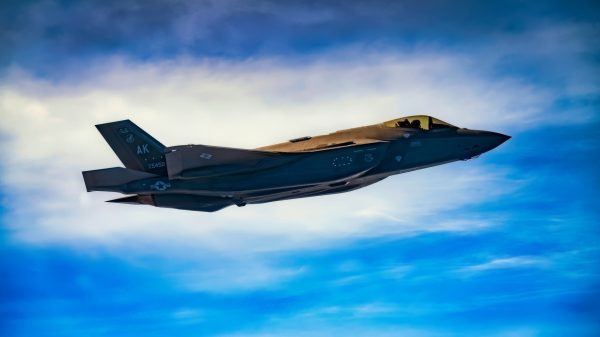 A U.S. Air Force F-35A Lightning assigned to the 356th Fighter Squadron, Eielson Air Force Base, Alaska, flies alongside of a U.S. Air Force KC-46A Pegasus assigned to the 77th Aerial Refueling Squadron, Seymour Johnson AFB, North Carolina, over the Pacific Ocean while enroute to the Singapore Airshow 2022, Feb. 11, 2022. The Singapore Airshow is the largest defense exhibition and biennial international tradeshow in the Pacific attracting thousands of participants from 50 countries. The U.S. Military is participating in Singapore Airshow 2022 by providing aerial demonstrations and static aircraft to demonstrate commitment and build upon partnerships with Singapore. (U.S. Air Force photo by Master Sgt. Richard P. Ebensberger)