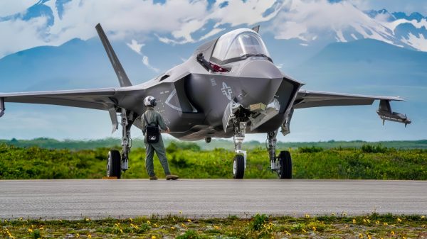 A U.S. Marine Corps F-35B Lightning II Joint Strike Fighter assigned to Marine Corps Air Station Beaufort, parks on a runway for a forward armed and refueling point (FARP) for ARCTIC EDGE 2025, August 18, 2025, at Cold Bay Airfield, Alaska. AE25 provided Special Operations Command North the opportunity to test a range of capabilities and response options to deter, disrupt, degrade, and deny competitor activity in the Arctic in support of globally integrated layered defense of the homeland. AE25 is a NORAD and U.S. Northern Command-led homeland defense exercise designed to improve readiness, demonstrate capabilities, and enhance Joint and Allied Force interoperability in the Arctic. (U.S. Air Force photo by Airman 1st Class Gracelyn Hess)
