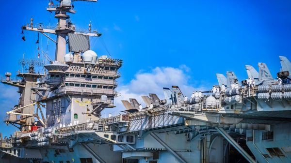 The Nimitz-class aircraft carrier USS Carl Vinson (CVN 70) arrives in Joint Base Pearl Harbor-Hickam, Hawaii, for a scheduled port visit, July 30, 2025. Vinson, the flagship of Carrier Strike Group ONE, is underway conducting routine operations in the U.S. 3rd Fleet area of operations. (U.S. Navy photo by Roann Gatdula)