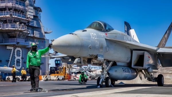 Aviation Boatswain’s Mate (Equipment) 3rd Class Mark Ruiz, assigned to Air Department aboard the world's largest aircraft carrier, USS Gerald R. Ford (CVN 78), prepares a Carrier Air Wing 8 F/A-18E Super Hornet attached to Strike Fighter Squadron 37 for launch on the flight deck, Aug. 1, 2025. Gerald R. Ford, a first-in-class aircraft carrier and deployed flagship of Carrier Strike Group Twelve, is on a scheduled deployment in the U.S. 6th Fleet area of operations to support the warfighting effectiveness, lethality and readiness of U.S. Naval Forces Europe-Africa, and defend U.S., Allied and partner interests in the region. (U.S. Navy photo by Mass Communication Specialist 2nd Class Mariano Lopez)