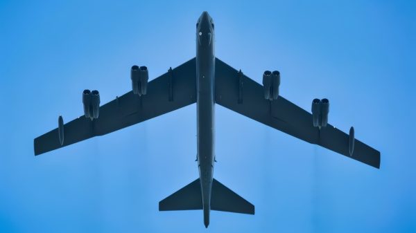 Military service members, veterans, and citizens of Guam gathered for the Memorial Day Commemoration at the Guam Veterans Cemetery. The Ceremony consisted of a fly over from a B-52H Stratofortress, a musical performance from the Guam Territorial Band & Cantate, guest speaking from the honorable Eddie Baza Calvo, a Fallen Soldier Gravesite Tribute, and the playing of Taps. (U.S. Marine Corps photo by Lance Cpl. Jacob Snouffer/Released)