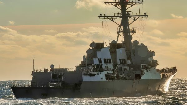 The Arleigh Burke-class guided-missile destroyer USS Lassen (DDG 82) moves into position for an underway exercise with the British Royal Navy aircraft carrier HMS Queen Elizabeth (R08) and Pre-Commissioning Unit (PCU) Michael Monsoor (DDG 1001). The future USS Michael Monsoor is the second ship in the Zumwalt-class of guided-missile destroyers. (Photo by Mass Communication Specialist 1st Class John Philip Wagner, Jr./Released)