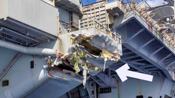 MEDITERRANEAN SEA (Feb. 13, 2025) Exterior damage of USS Harry S. Truman (CVN 75) viewed from a ship’s rigid-hull inflatable boat following a collision with merchant vessel Besiktas-M, Feb. 12, while operating in the vicinity of Port Said, Egypt. USS Harry S. Truman, the flagship of the Harry S. Truman Carrier Strike Group (HSTCSG), is on a scheduled deployment in the U.S. 6th Fleet area of operations supporting U.S. Naval Forces Europe-Africa to defend U.S., Allied and partner interests. (U.S. Navy photo by Mass Communication Specialist 1st Class Cody Beam)