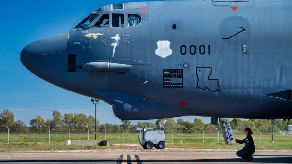 Capt. Karla Arango, 20th Bomb Squadron pilot, communicates to crew inside a B-52 Stratofortress during Global Thunder 2019 at Barksdale Air Force Base, La., Nov. 3, 2018. Global Thunder is an annual U.S. Strategic Command (USSTRATCOM) exercise designed to provide training opportunities to test and validate command, control and operational procedures. The training is based on a notional scenario developed to drive execution of USSTRATCOM and component forces' ability to support the geographic combatant commands, deter adversaries and, if necessary, employ forces as directed by the President of the United States. (U.S. Air Force photo by Senior Airman Philip Bryant)