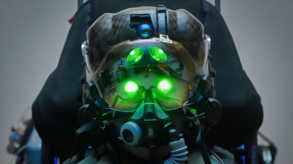 Capt. Ryosuke Sugimoto, a Japanese Air Self-Defense Force F-35 Lightning II pilot, sits in an ejection seat wearing his new pilot gear after completing the 1,000th fitting in the pilot fit facility at Eglin Air Force Base, Florida, May 22, 2024. This milestone fitting underscores the strong international partnership and commitment to pilot readiness and safety. (U.S. Air Force photo by 1st Lt. Jymil Licorish)