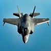 A U.S. Marine Corps F-35B Lightning II resumes a combat air patrol after aerial refueling with a U.S. Air Force KC-135 Stratotanker over the U.S. Central Command area of responsibility, Sept. 19, 2025. More than a fighter jet, the F-35’s ability to collect, analyze and share data, is a powerful force multiplier that enhances all airborne, surface and ground-based assets in the battlespace. (U.S. Air Force photo by Senior Airman Keegan Putman)