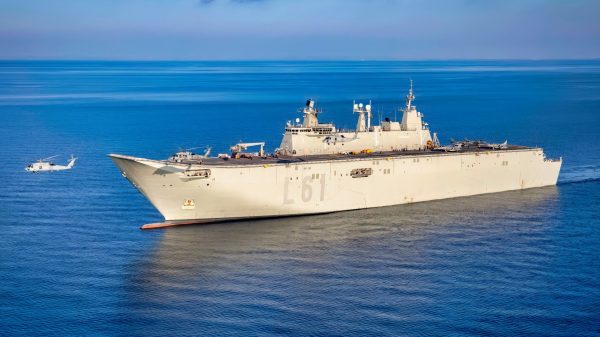 ADRIATIC SEA (Feb. 22, 2023) An MH-60S Sea Hawk helicopter attached to Helicopter Sea Combat Squadron (HSC) 5 and two Spanish navy SH-60B helicopters fly near the Spanish navy multi-purpose amphibious assault ship ESPS Juan Carlos I (LHD 61) during interoperability training in the Adriatic Sea, Feb. 22, 2023. Carrier Air Wing (CVW) 7 is the offensive air and strike component of Carrier Strike Group (CSG) 10 and the George H.W. Bush CSG. The squadrons of CVW-7 are Strike Fighter Squadron (VFA) 143, VFA-103, VFA-86, VFA-136, Carrier Airborne Early Warning Squadron (VAW) 121, Electronic Attack Squadron (VAQ) 140, HSC-5, and Helicopter Maritime Strike Squadron (HSM) 46. The George H.W. Bush CSG is on a scheduled deployment in the U.S. Naval Forces Europe area of operations, employed by U.S. 6th Fleet to defend U.S., allied and partner interests. (U.S. Navy photo by Mass Communication Specialist 3rd Class Samuel Wagner)