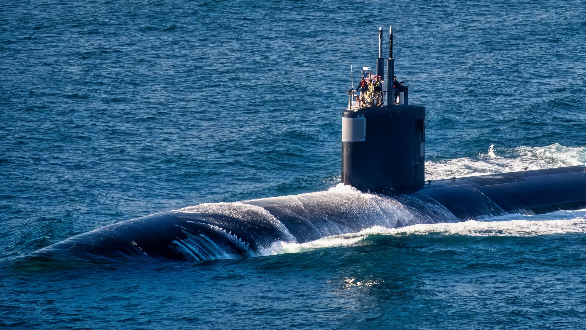 (Mar. 21, 2025) – The Los Angeles-class fast-attack submarine, USS Santa Fe (SSN 763), transits the Pacific Ocean, March 21, 2025. Santa Fe is one of four Los Angeles-class fast-attack submarines assigned to Commander, Submarine Squadron 11. Santa Fe is part of Commander Submarine Squadron 11, home to four Los Angeles-class fast-attack submarines, which are capable of supporting various missions, including anti-submarine warfare, anti-ship warfare, strike warfare and intelligence, surveillance and reconnaissance. (U.S. Navy photo by Mass Communication Specialist 1st Class Keenan Daniels)