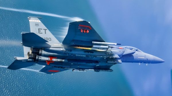 A 96th Test Wing F-15E Strike Eagle flies during a test mission May 22, 2025 over Eglin Air Force Base, Florida. The 96 TW and the 53rd Wing teamed up to test AGR-20F Advanced Precision Kill Weapon System II laser-guided rockets on the F-15E in May in an effort to get the capability to the warfighter as quickly as possible. (U.S. Air Force photo by Staff Sgt. Thomas Barley)