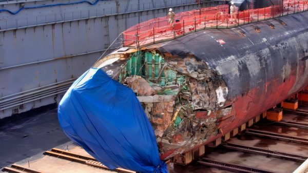 Apra Harbor, Guam (Jan. 27, 2005) USS San Francisco (SSN 711) in dry dock to assess damages sustained after running aground approximately 350 miles south of Guam Jan. 8. USS San Francisco, a fast-attack submarine, is attached to Submarine Squadron 15. U.S. Navy photo by Photographer's Mate 2nd Class Mark Allen Leonesio.