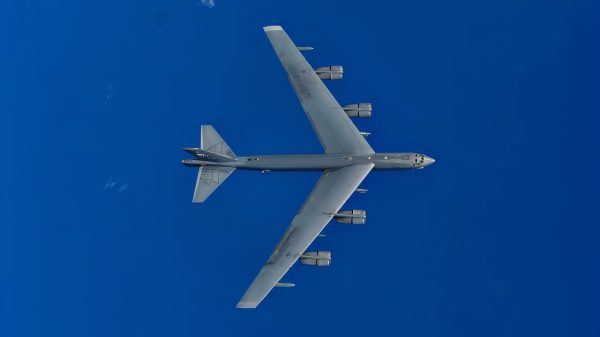 A B-52H Stratofortress from the 69th Bomb Squadron, Minot Air Force Base, N.D., flies over the Pacific Ocean during an international sinking exercise for Rim of the Pacific 2016 near Joint Base Pearl Harbor-Hickam, July 14, 2016. Twenty-six nations, more than 40 ships and submarines, more than 200 aircraft, and 25,000 personnel are participating in RIMPAC from June 30 to Aug. 4 in and around the Hawaiian Islands and Southern California. The world's largest international maritime exercise, RIMPAC, provides a unique training opportunity that helps participants foster and sustain the cooperative relationships that are critical to ensuring the safety of sea lanes and security on the world's oceans. RIMPAC 2016 is the 25th exercise in the series that began in 1971. (U.S. Air Force photo by Tech. Sgt. Aaron Oelrich/Released)