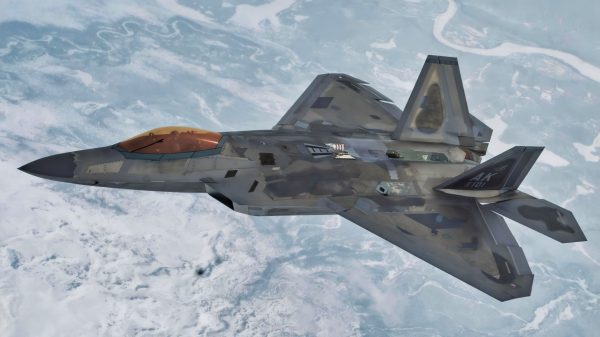 A U.S. Air Force F-22 Raptor assigned to Joint Base Elmendorf-Richardson, Alaska flies over the Alaskan mountain range during Northern Edge 23-1, May 10, 2023. NE 23-1 allows the U.S. Joint Force to more fully develop Joint All-Domain Operations (JADO) concepts through exercises and experimentation for application in operations around the world. (U.S. Air Force photo by 2nd Lt. Ariana Wilkinson)