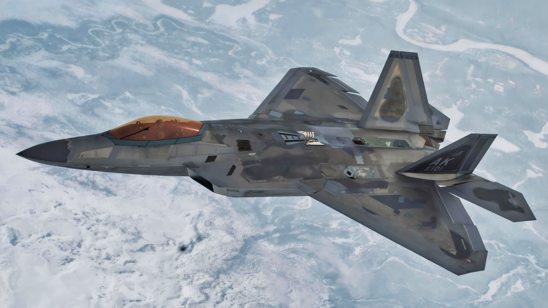 A U.S. Air Force F-22 Raptor assigned to Joint Base Elmendorf-Richardson, Alaska flies over the Alaskan mountain range during Northern Edge 23-1, May 10, 2023. NE 23-1 allows the U.S. Joint Force to more fully develop Joint All-Domain Operations (JADO) concepts through exercises and experimentation for application in operations around the world. (U.S. Air Force photo by 2nd Lt. Ariana Wilkinson)