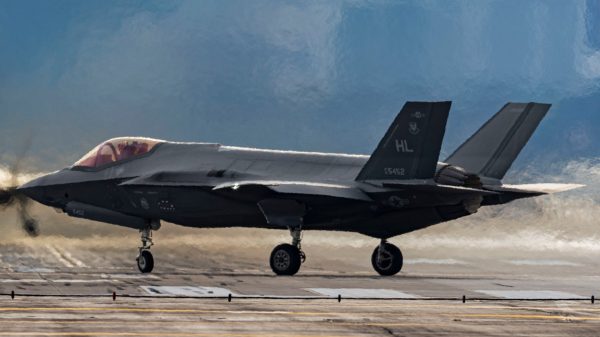 A U.S. Air Force F-35 Lightning II assigned to the 421st Fighter Squadron, Hill Air Force Base (AFB), Utah, prepares to launch out for a Red Flag-Nellis 24-1 mission while another takes off at Nellis AFB, Jan. 23, 2024. This Red Flag will have approximately 30 units and close to 2,000 participants from U.S. and Allied forces. (U.S. Air Force photo by Senior Airman Zachary Rufus)