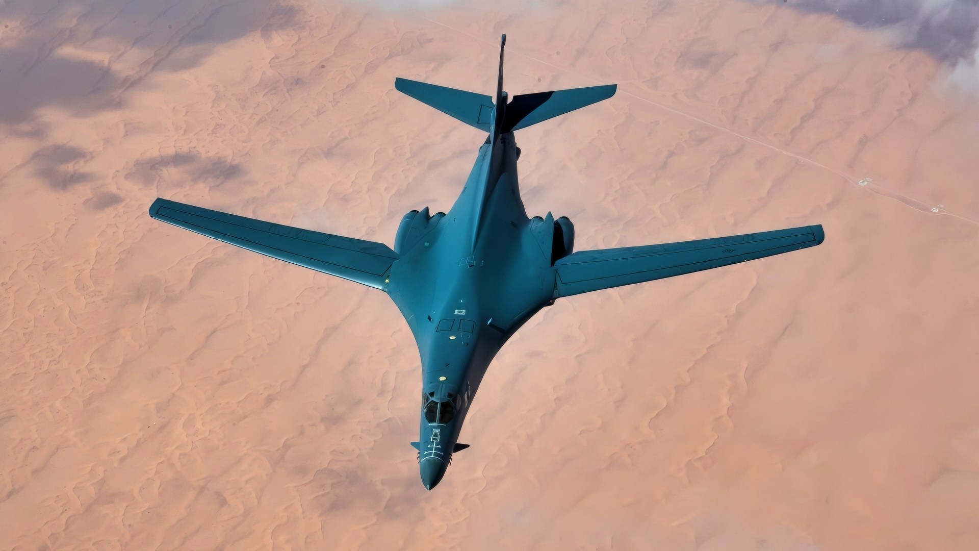 A U.S. Air Force B-1B Lancer departs after conducting aerial refueling with a 28th Expeditionary Air Refueling Squadron KC-135 Stratotanker during a mission in the U.S. Central Command area of operations, Oct. 25, 2019. The B-1B flew directly from its home station of Ellsworth Air Force Base, S.D., demonstrating the U.S. Air Force’s ability to rapidly deploy strategic bombers anywhere in the world. (U.S. Air Force photo by Master Sgt. Russ Scalf)